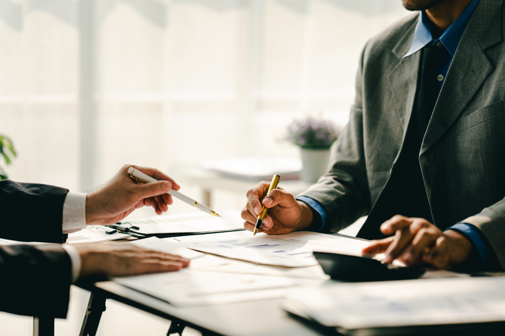 Bankruptcy attorney discussing finances during consultation