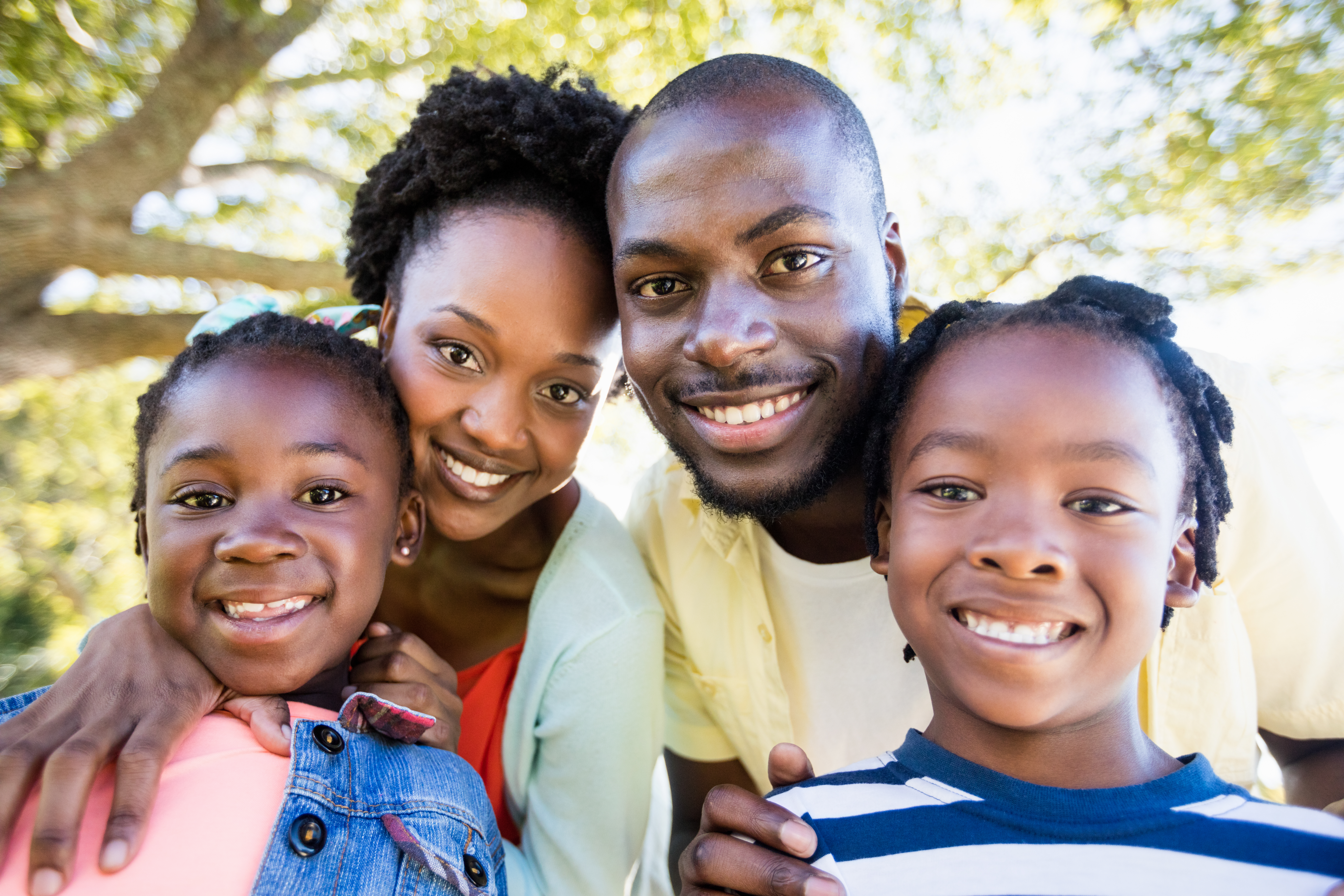 Happy Family Together At Park